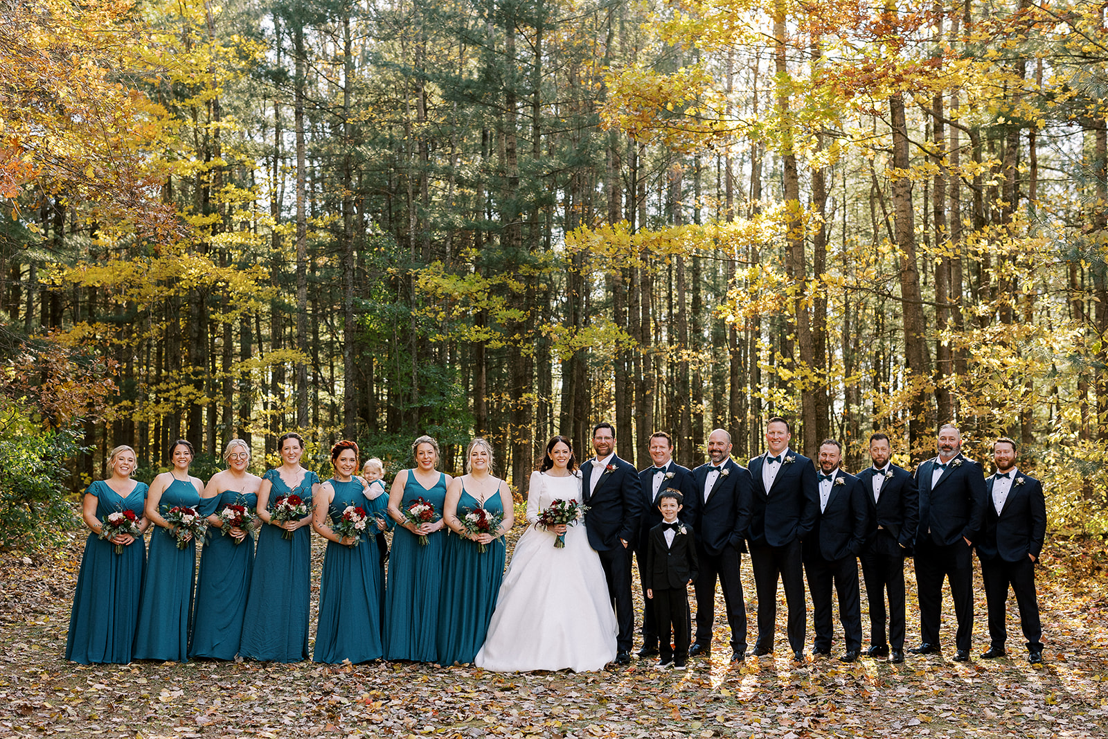 Stunning fall bridal party with floral