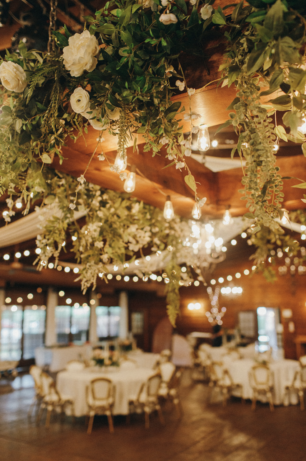 Beautiful floral chandelier at wedding reception