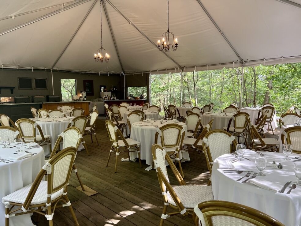 Woodside Tent Setup for a dinner rehersal Table setup for an event in Woodside Tent